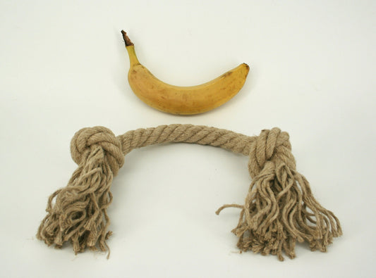 Large simple hemp rope dog toy banana for scale