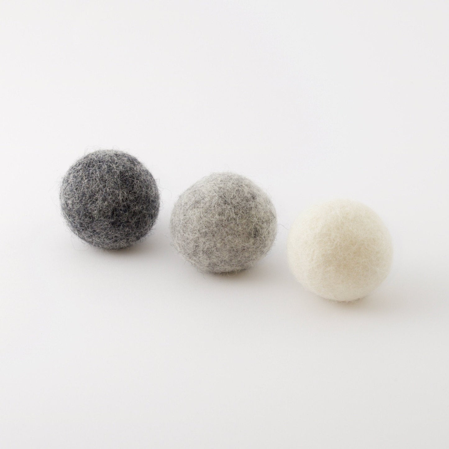 three wool ball cat toys