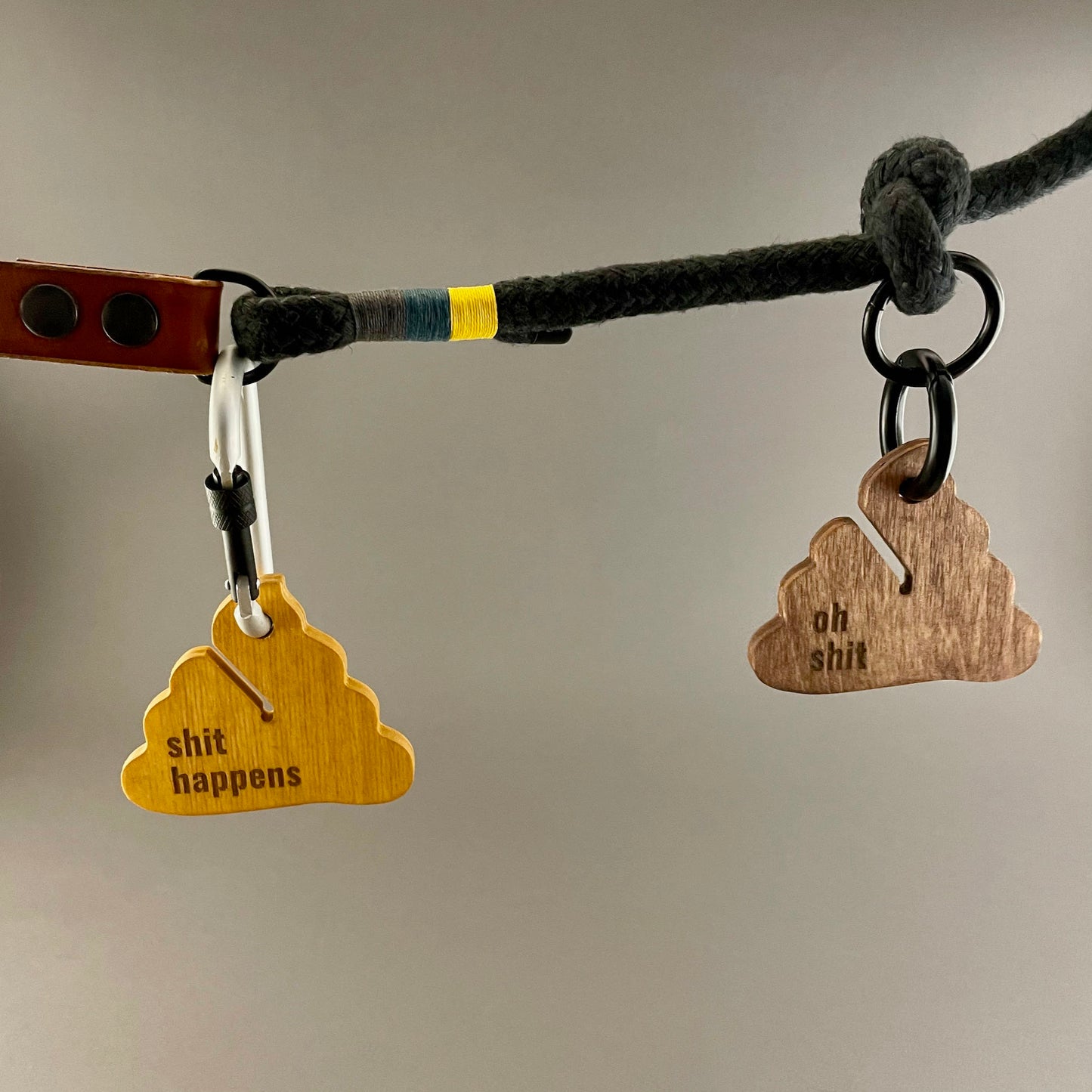 brown and yellow poop bag holders for dog owners